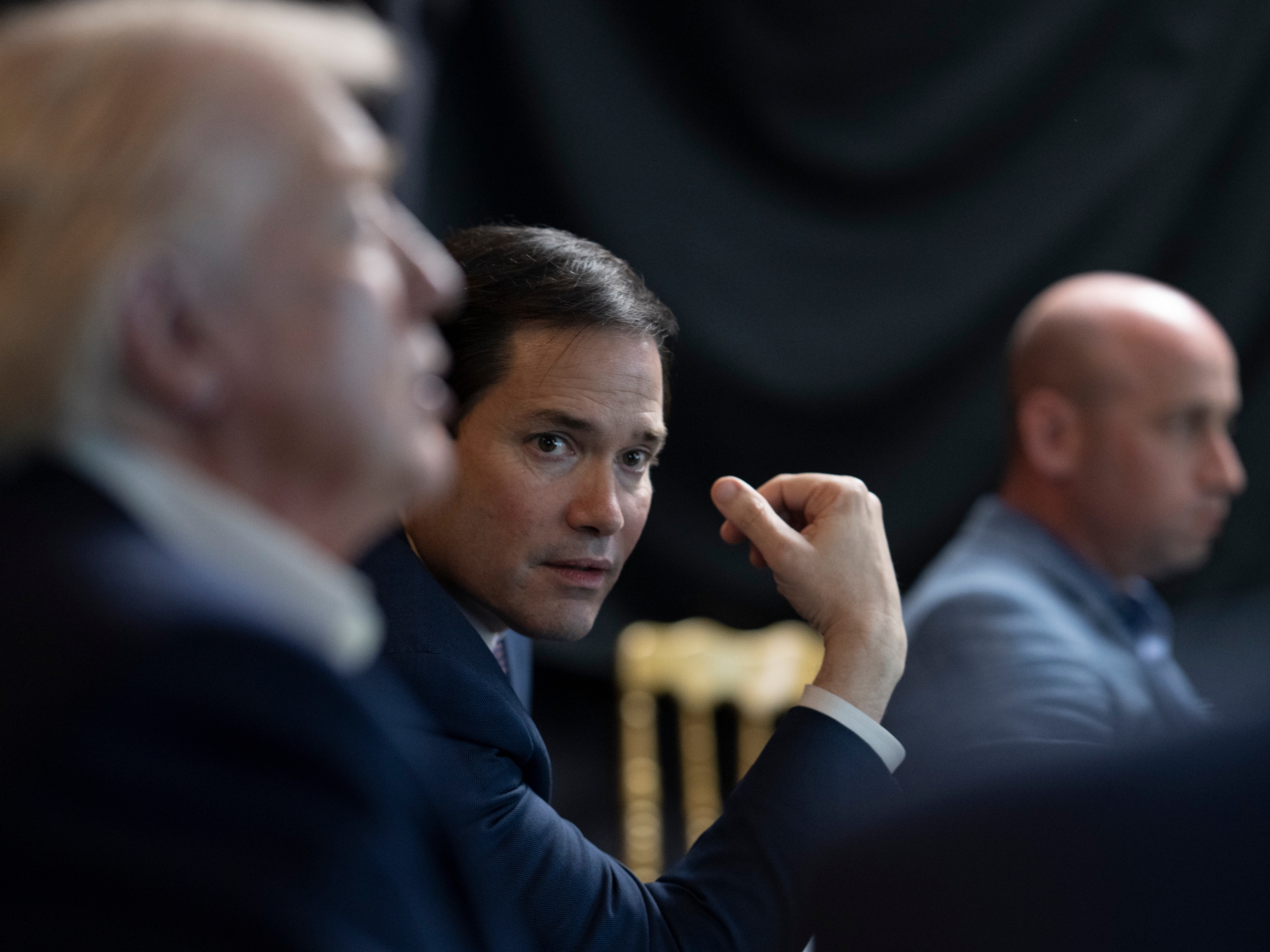 caption: In this photo released by the White House, President Donald Trump monitors U.S. military operations in Venezuela, with Secretary of State Marco Rubio and White House deputy chief of staff Stephen Miller at Mar-a-Lago in Palm Beach, Fla., Saturday, Jan. 3, 2026.