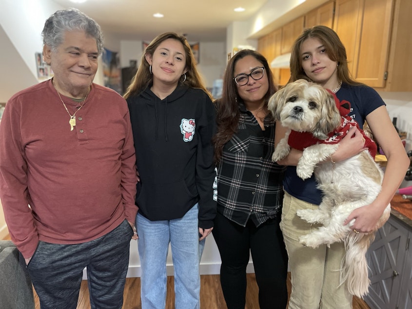 caption: Wanda Maldonado with her family. Left to right, they are Angel Maldonado, Annalina Rivera, Wanda Maldonado, Talieana Rivera with dog Jiffy.