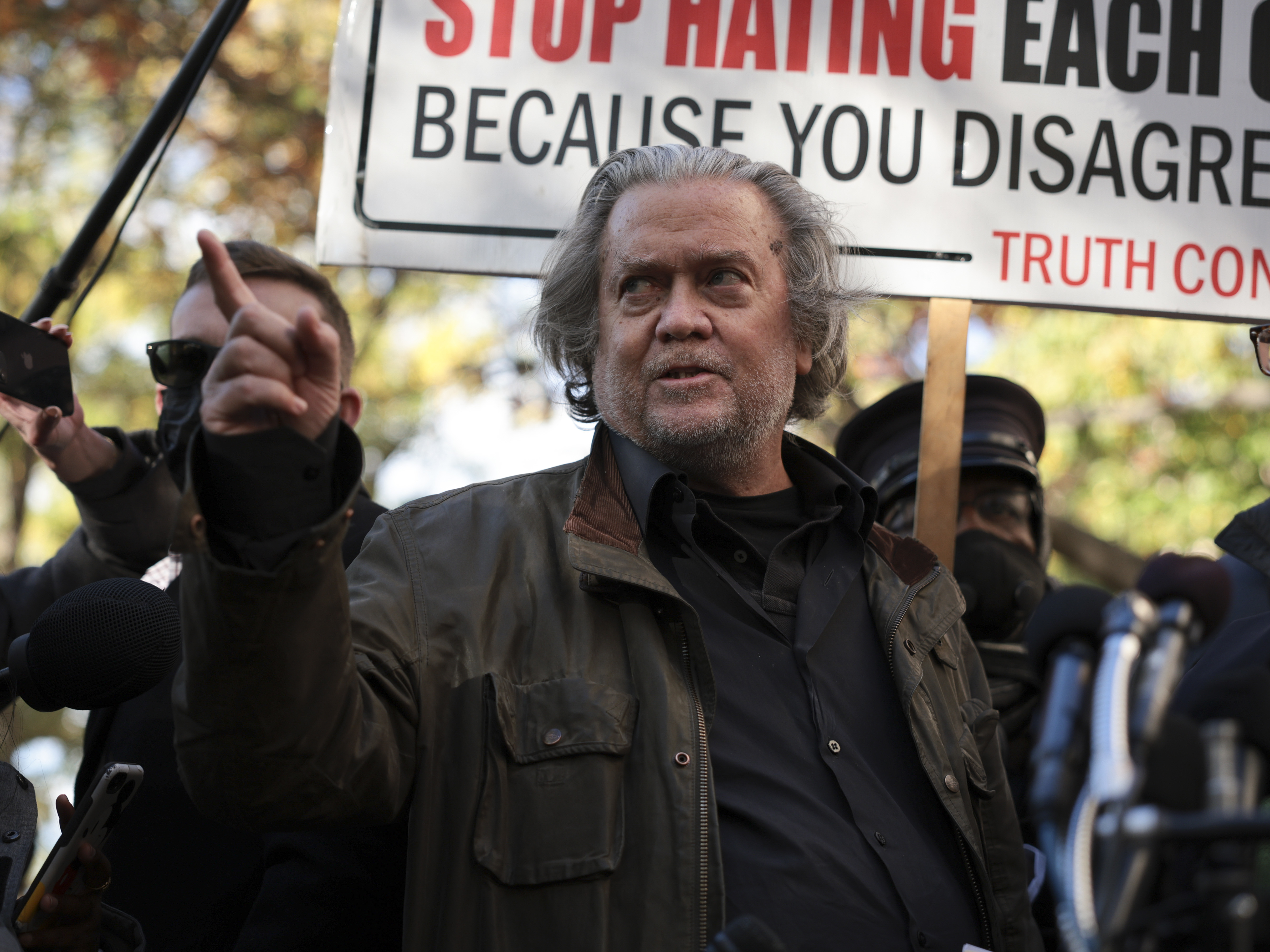 caption: Steve Bannon speaks to reporters outside of the federal district courthouse in Washington, D.C., on Monday. Bannon was indicted last week on two counts of contempt of Congress.