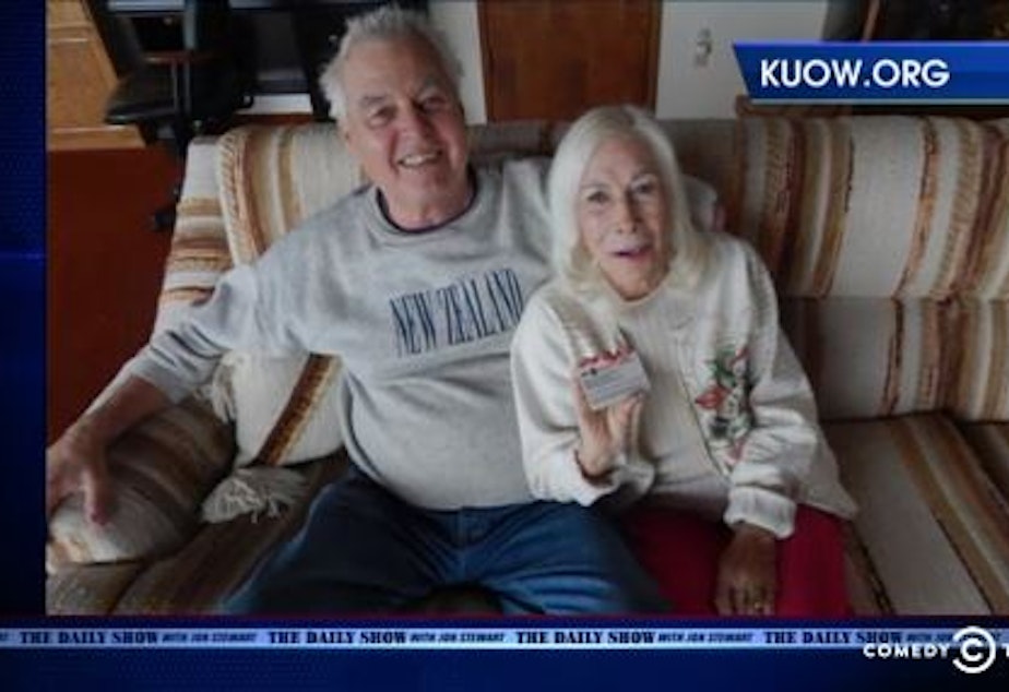 caption: The Daily Show featured KUOW reporter Patricia Murphy's story on 89-year-old Gloria Hoeppner's difficulties with a Veterans Affairs program. She is shown at home with her husband, Earl Kornbrekke.