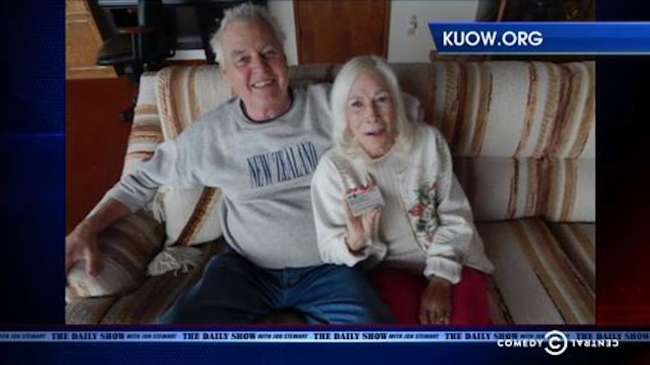 caption: The Daily Show featured KUOW reporter Patricia Murphy's story on 89-year-old Gloria Hoeppner's difficulties with a Veterans Affairs program. She is shown at home with her husband, Earl Kornbrekke.
