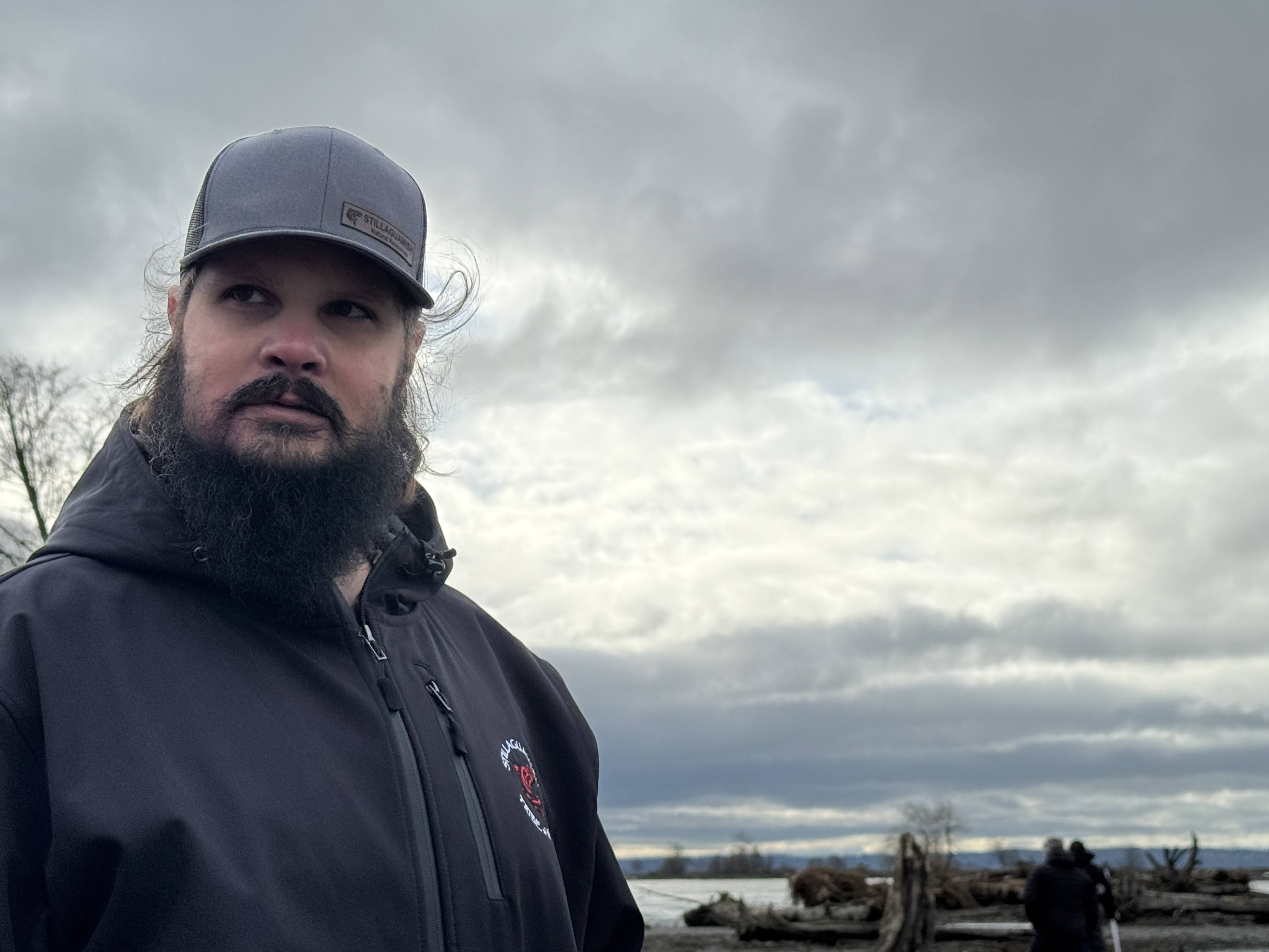 caption: Stillaguamish Tribe deputy fisheries manager Scott Boyd at the mouth of the Stillaguamish River on Dec. 19, 2025.