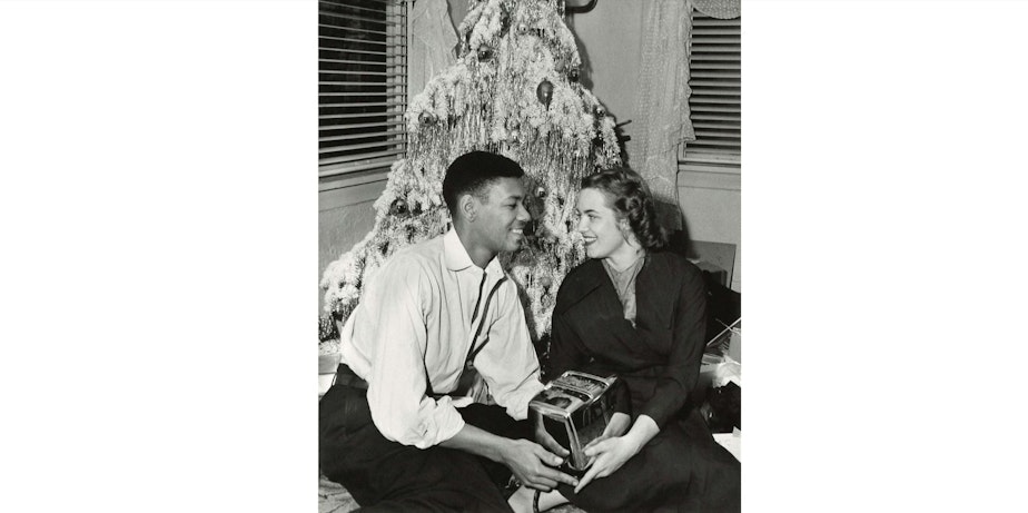 caption: An unidentified couple around 1950. (To help us ID this couple, note the photo number. This is #8.)