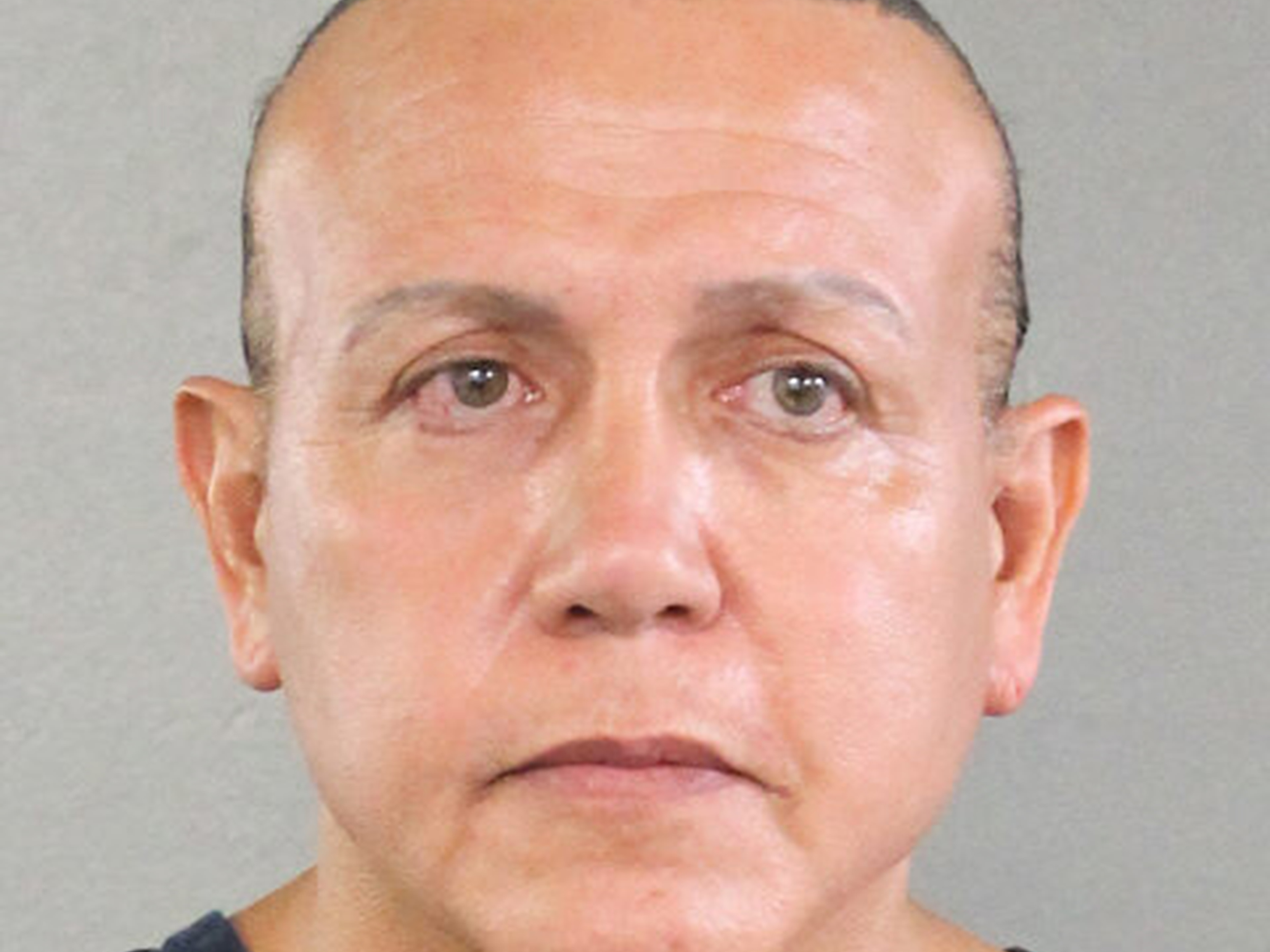 caption: An undated police mugshot of Cesar Sayoc, who was charged Friday with sending explosive devices to critics of President Trump.