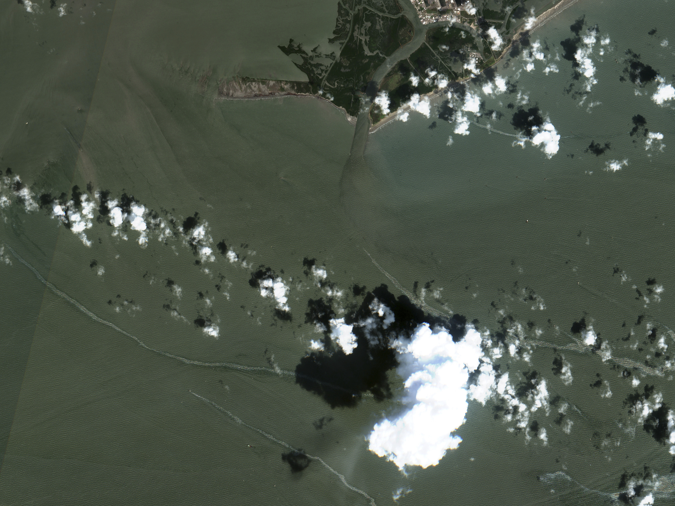 caption: In a satellite image, an oil slick is shown on Sept. 2, south of Port Fourchon, La., following Hurricane Ida.