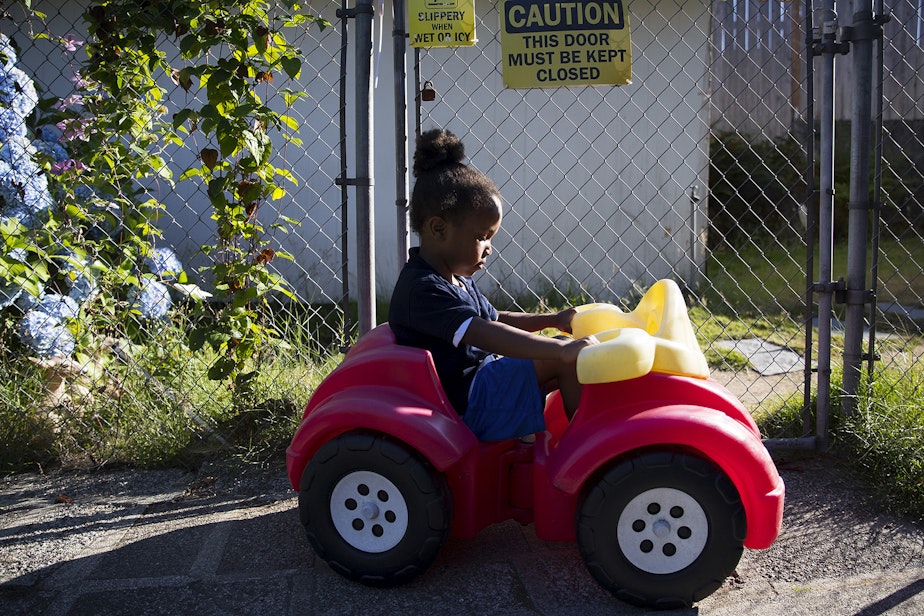 caption: FILE PHOTO: Curtis Brown, 5, plays at an overnight daycare facility on Thursday, August 1, 2019, in Renton.