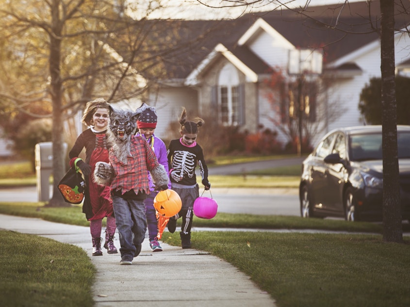 caption: Halloween is one more thing being upended by the pandemic. Federal guidelines advise against traditional trick or treating, but parents around the country are trying to make the holiday special for their children anyway.