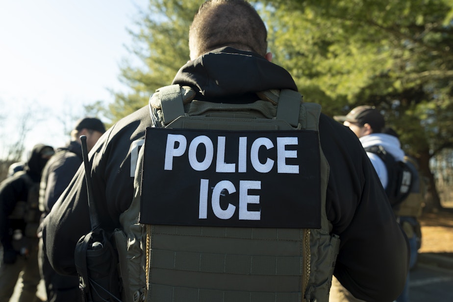 caption: U.S. Immigration and Customs Enforcement Baltimore Field Officer director Matt Elliston listens during a briefing, Monday, Jan. 27, 2025, in Silver Spring, Maryland.