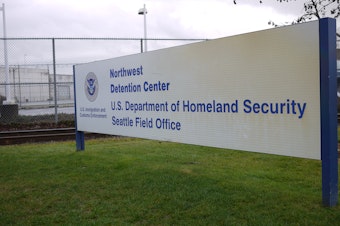 caption: Northwest Detention Center, Tacoma, Washington.