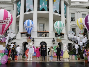 caption: (L-R) First lady Jill Biden, U.S. President Joe Biden, Vice President Kamala Harris and second gentleman Doug Emhoff wave to guests during the White House Easter Egg Roll on the South Lawn on April 1, 2024, in Washington, D.C.