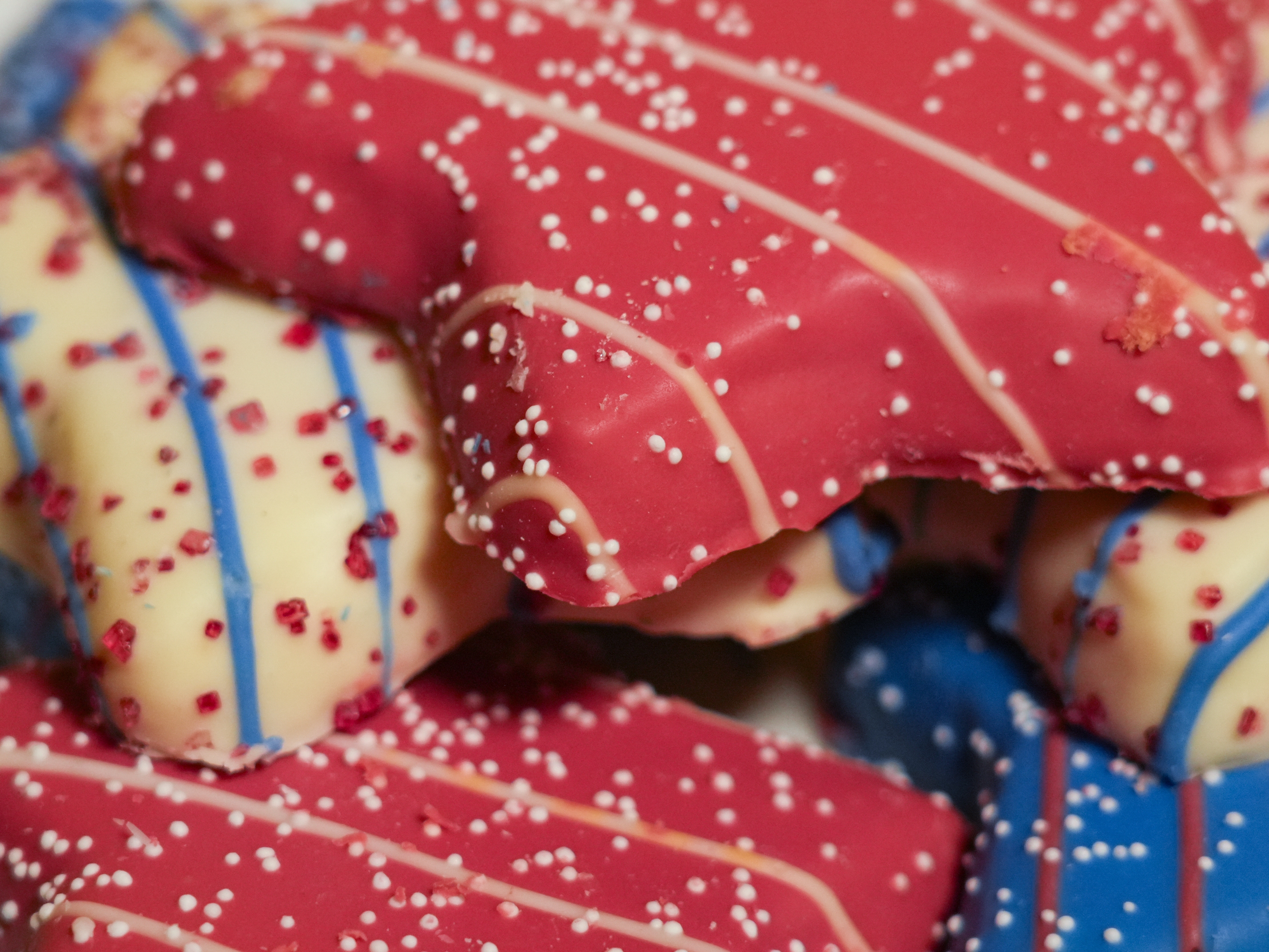 caption: Scientists at Sam's Club replaced artificial dyes in this star-shaped iced cookie with natural alternatives, but in a way that would keep the treat just as vividly colored.