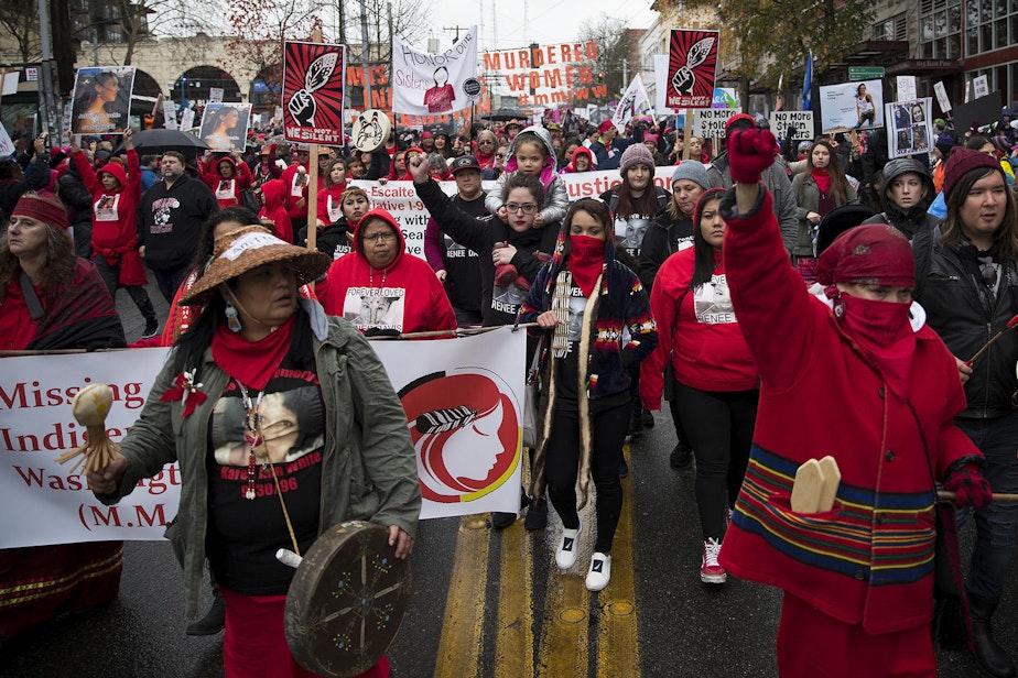 caption: Missing and Murdered Indigenous Women of Washington group members start the Women's March on Saturday, January 20, 2018, on Pine St., in Seattle.