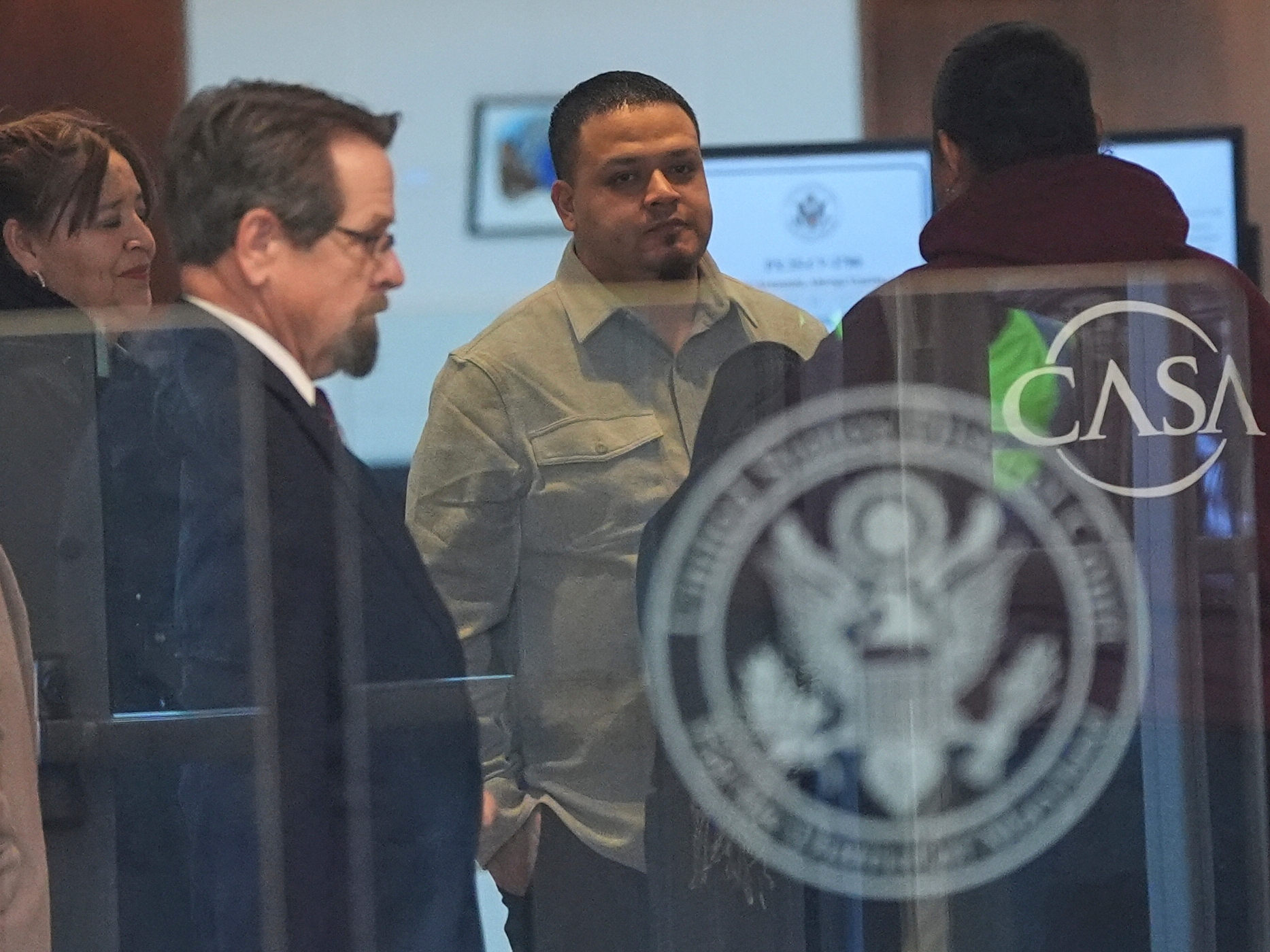 caption: Kilmar Abrego Garcia arrives at the United States District Court District of Maryland, Monday, Dec. 22, 2025, in Greenbelt, Md.