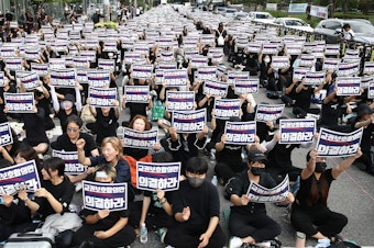 caption: South Korean teachers participate in a rally in front of the National Assembly on Sept. 4, 2023 in Seoul, South Korea. School teachers rallied to mourn the recent suicide deaths of fellow teachers distressed by disgruntled parents and unruly students, and to call for measures to prevent such tragedies.