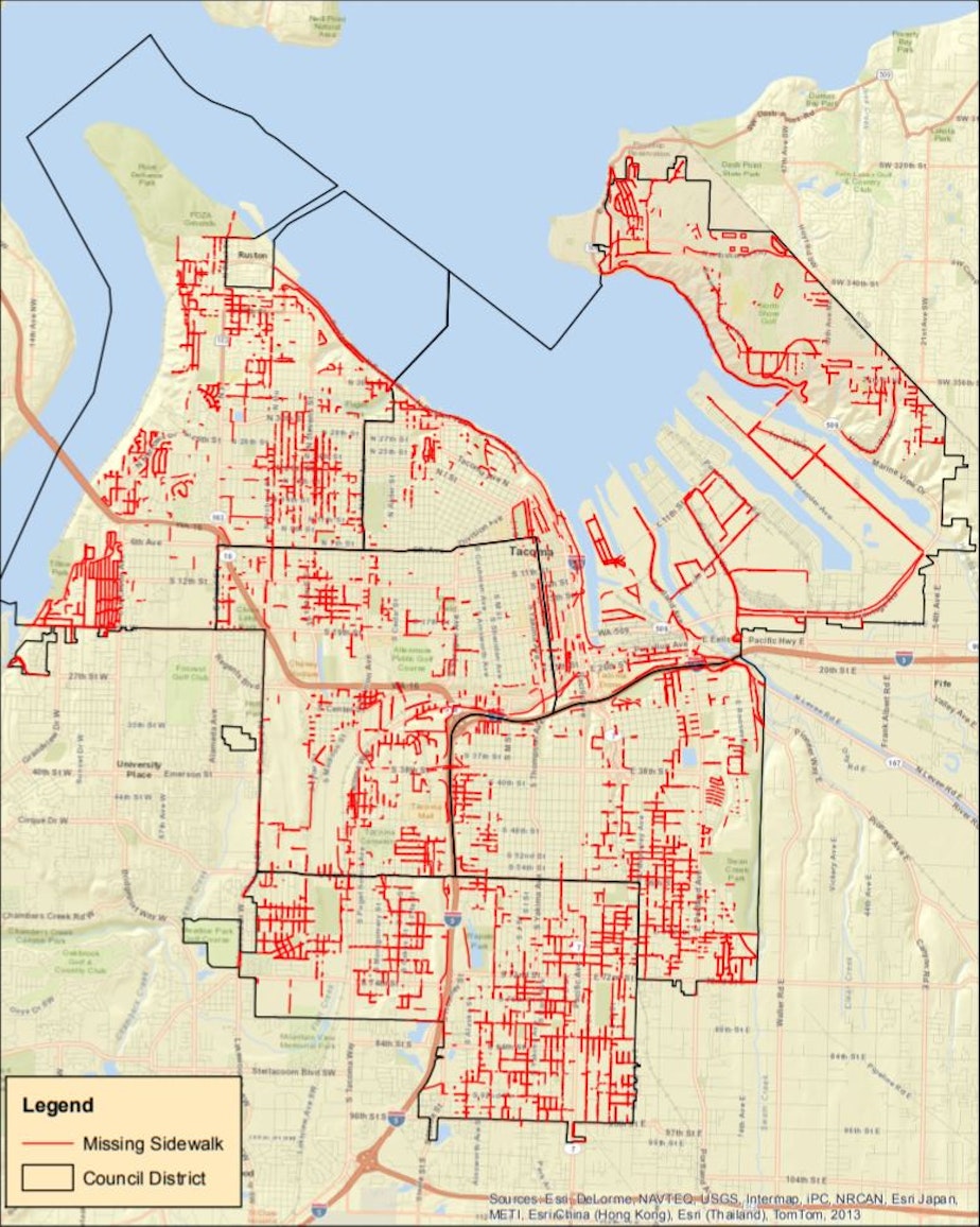 caption: Red lines mark streets in Tacoma that lack sidewalks.