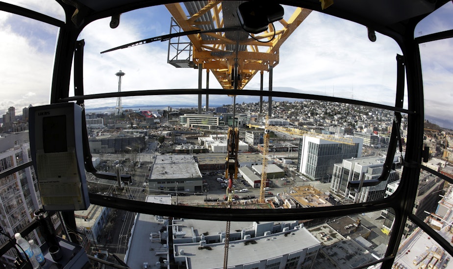 caption: A view of Seattle's future: Income tax and apartment construction?