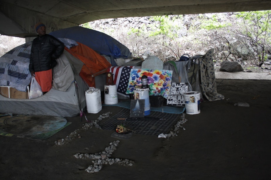 caption: William Kowang lives in the area under I-5 known as "the Jungle."