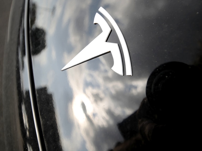 caption: California prosecutors have filed two counts of vehicular manslaughter against the driver of a Tesla on Autopilot that ran a red light, slammed into another car and killed two people in 2019.