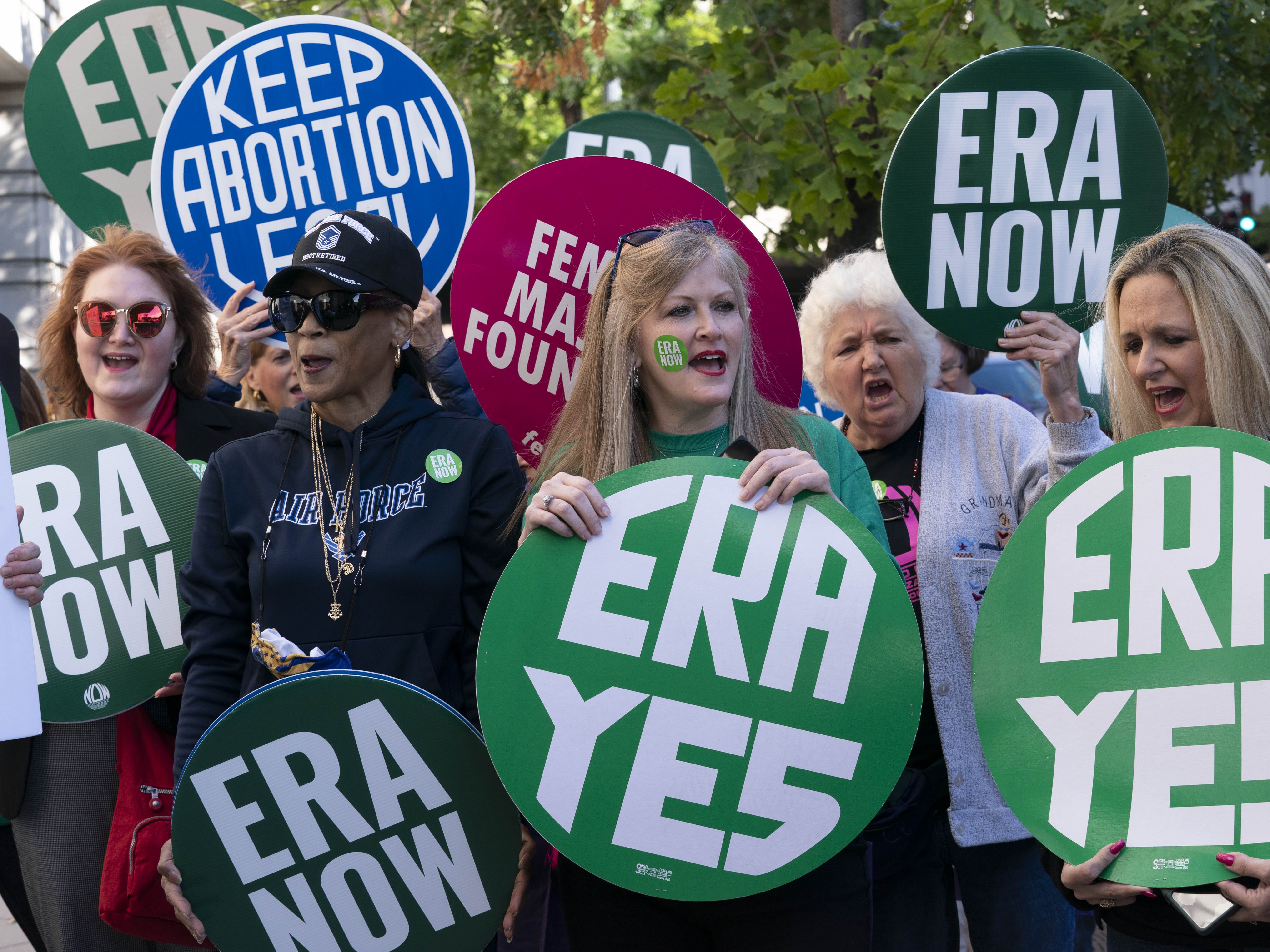 caption: Demonstrators urge ratification of the Equal Rights Amendment during a Sept. 28, 2022, rally in Washington, D.C.