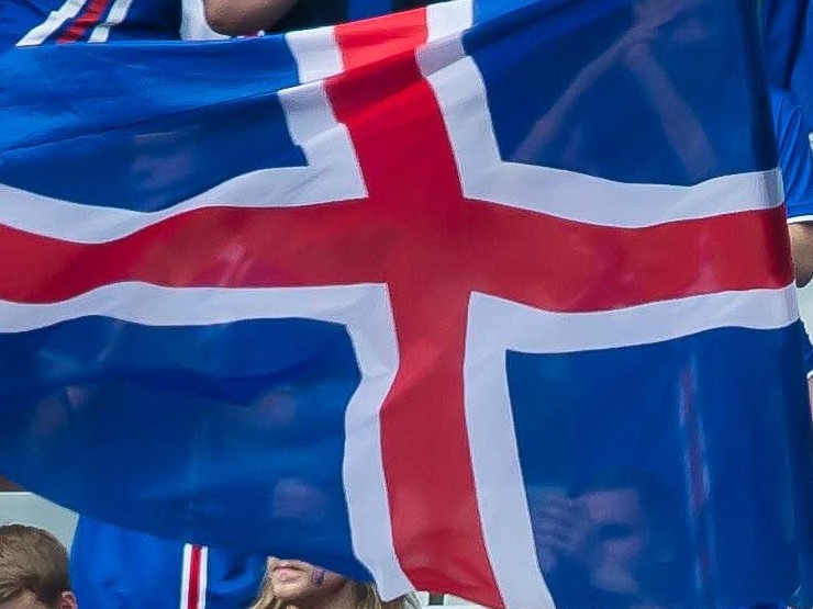 caption: Iceland's soccer federation is in turmoil, after a scandal over sexual assault allegations against players prompted a mass resignation. Here, the country's flag is seen in the stands during an international match.