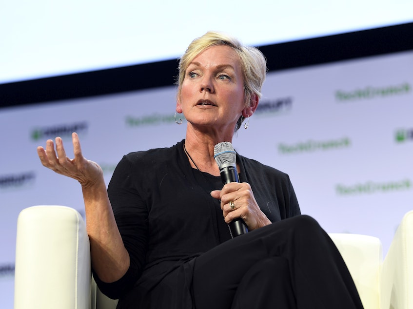 caption: Former Michigan Gov. Jennifer Granholm speaks onstage during a TechCrunch Disrupt conference in San Francisco in 2019.
