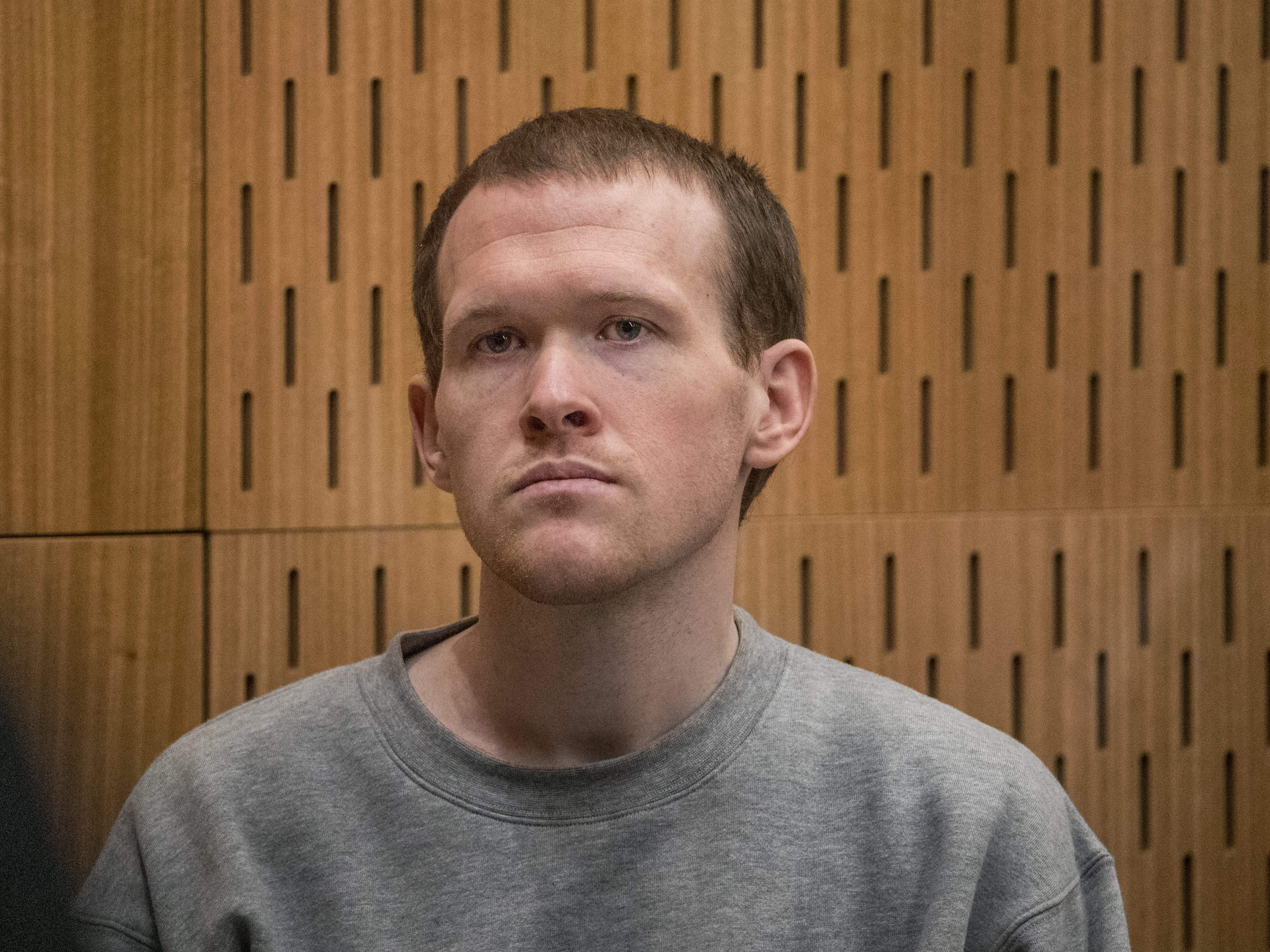 caption: White supremacist Brenton Tarrant is seen in court in Christchurch, New Zealand at his sentening Thursday. Tarrant was sentenced to life in prison without parole for the massacre of 51 Muslim worshippers.