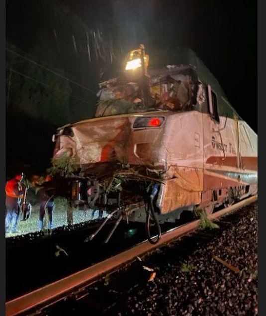 caption: An Amtrak Cascades train was heavily damaged after running into a fallen tree on Nov. 19, 2024.