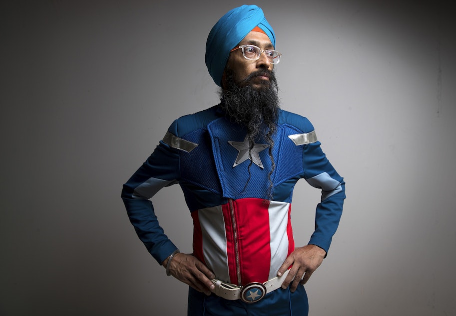 caption: Vishavjit Singh poses for a portrait on Thursday, May 10, 2018, at KUOW Public Radio in Seattle. 