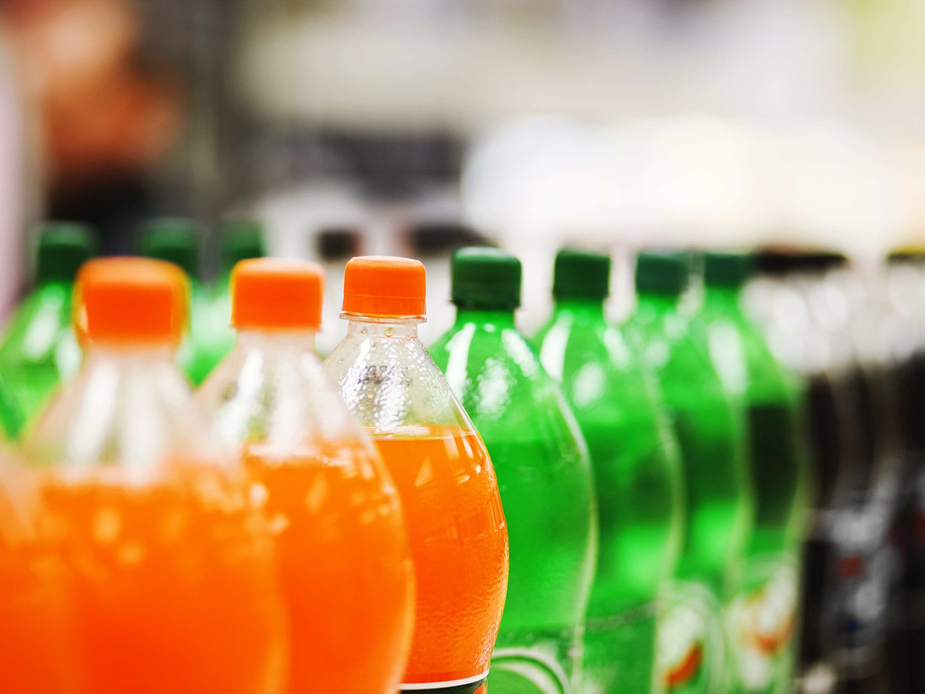 caption: Sugary drinks including soda are the leading source of added sugars in the American diet.