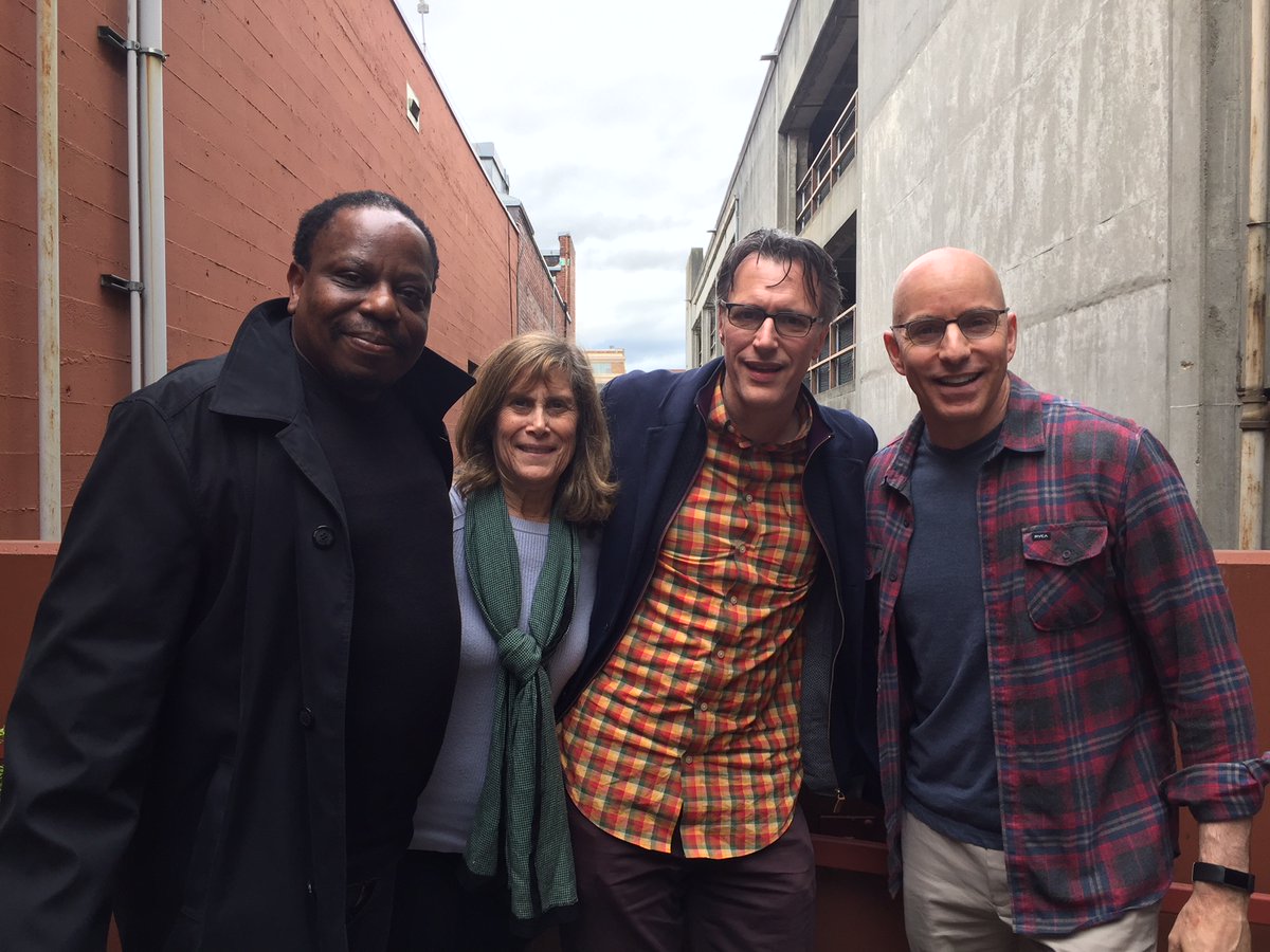 caption: L-R: Charles Mudede, Joni Balter, Bill Radke, C.R. Douglas