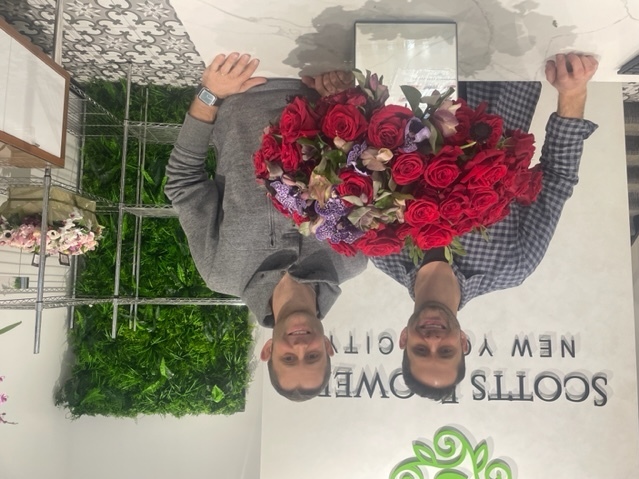 caption: Rob and Chris Palliser own Scott's Flowers, a Manhattan based flower shop, with their brother. Valentine's Day is the biggest day of the year for their business.