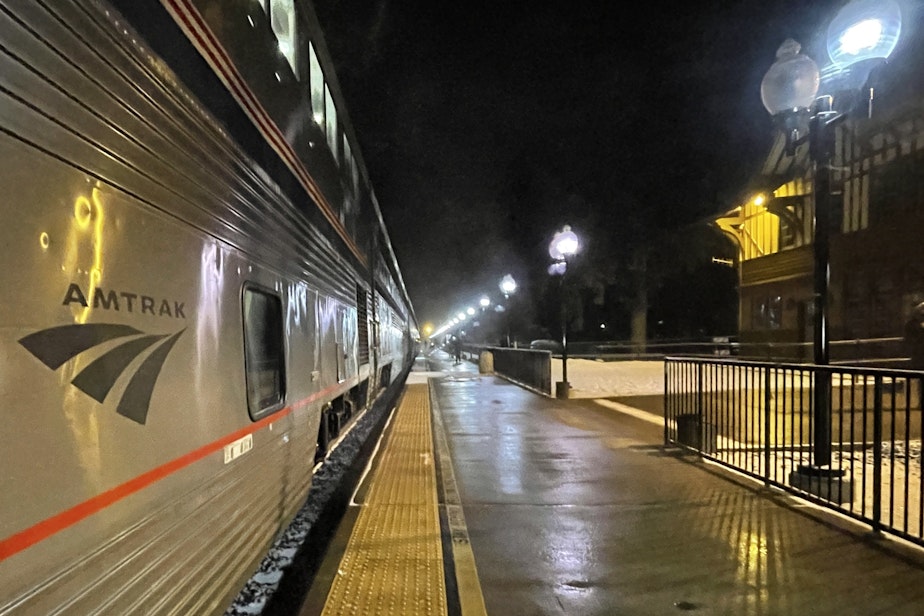caption: Amtrak’s Seattle-bound Empire Builder stops in Whitefish, Montana, in January 2023.