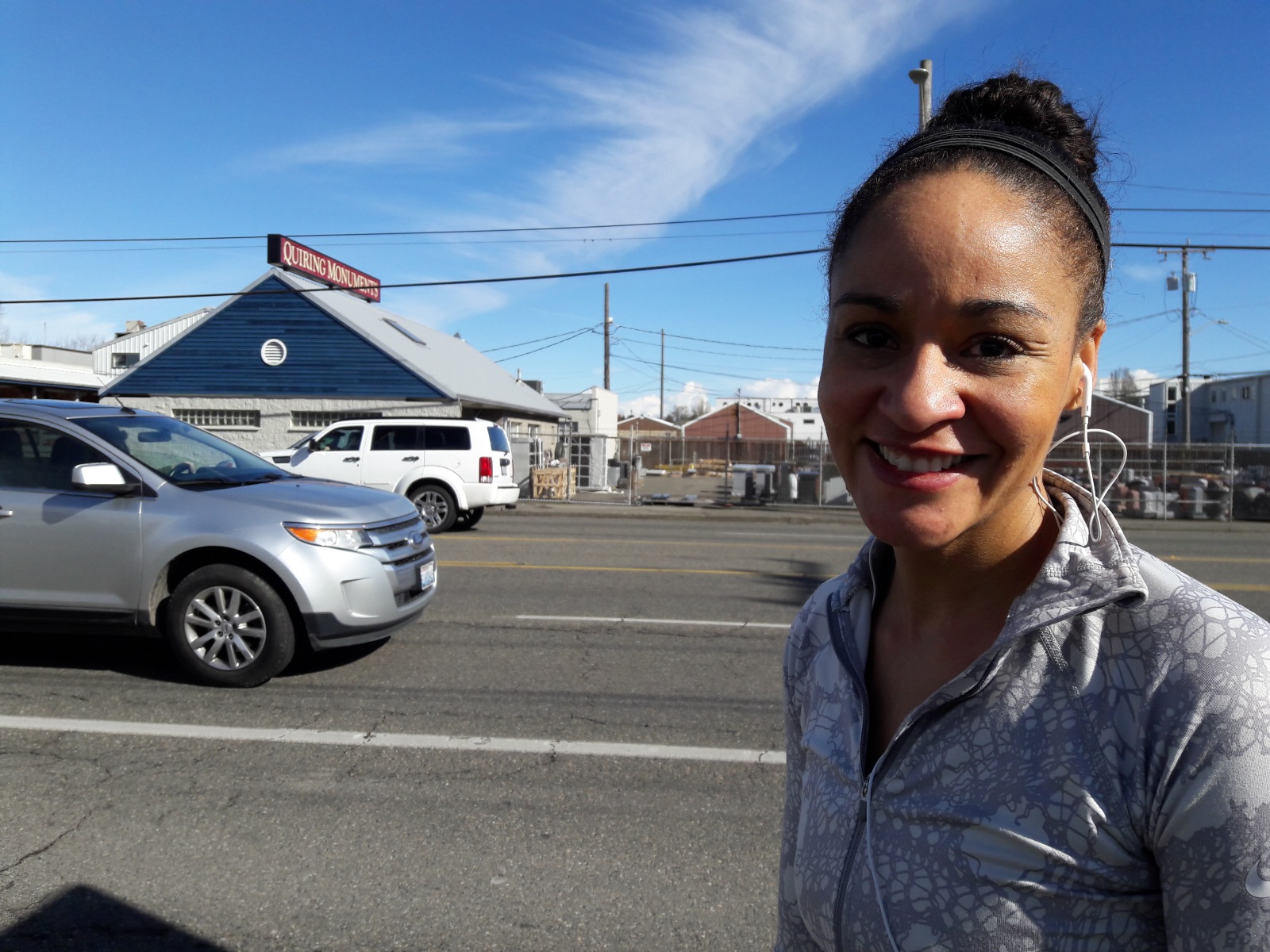caption: Cyanna DiRaimo, a jogger in Seattle, runs along Aurora for a block or two (to cross), and imagines Aurora as an urban village.