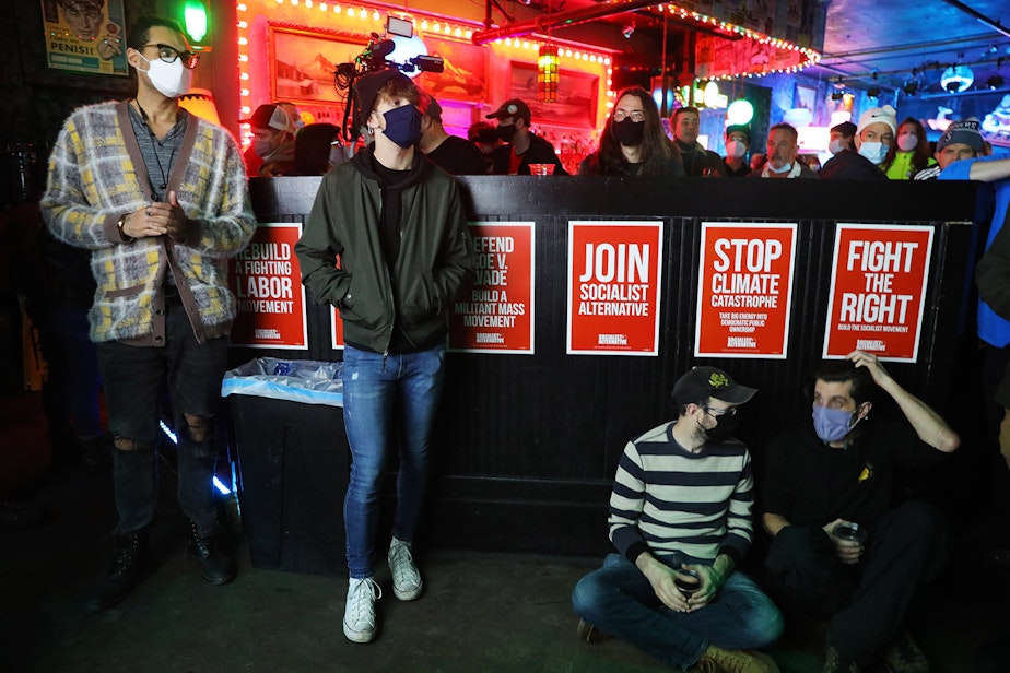 caption: The night of Kshama Sawant's recall vote. Sawant supporters gather at Chop Suey in Seattle's Capitol Hill neighborhood on December 7, 2021.
