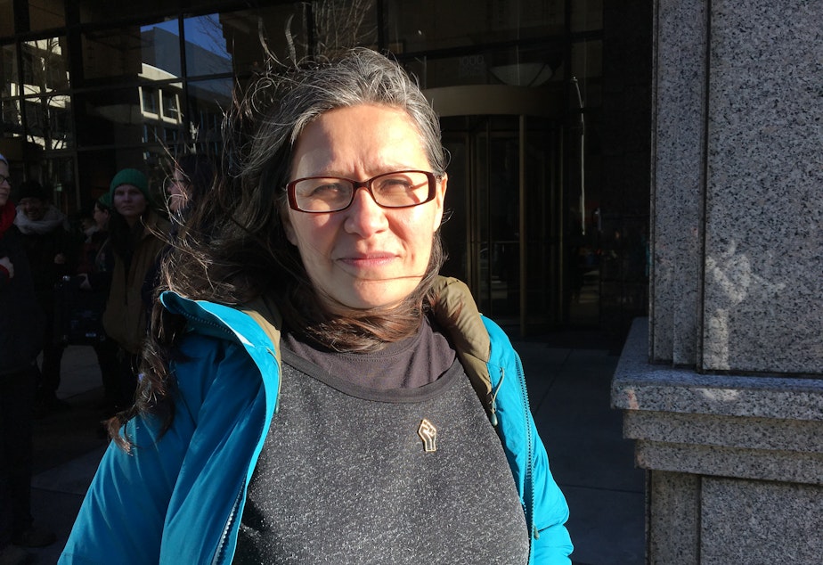 caption: Maru Mora-Villalpando outside the Seattle Immigration Court, following a news conference about her case.