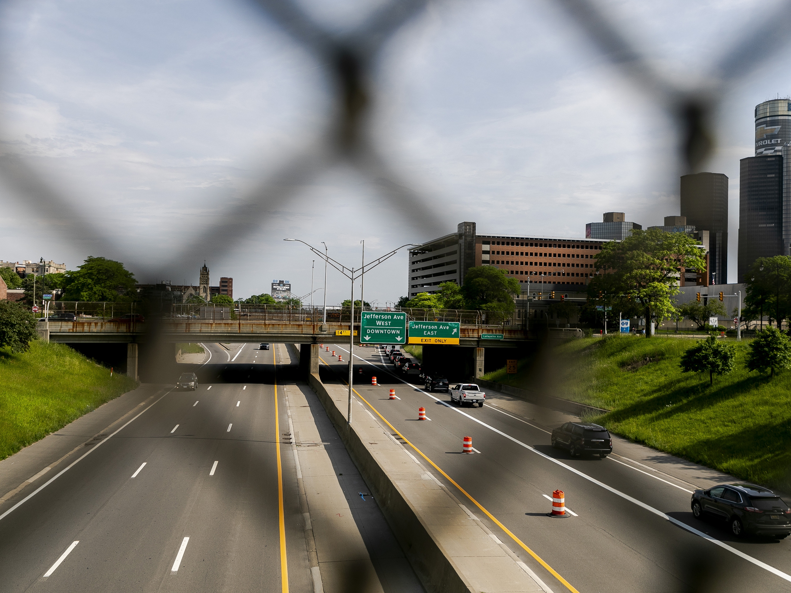 caption: Cars travel on the northbound and southbound Interstate-375 in Detroit, Mich., on May 17. The Michigan Department of Transportation is planning to replace the I-375 highway in Detroit with a surface-level boulevard.