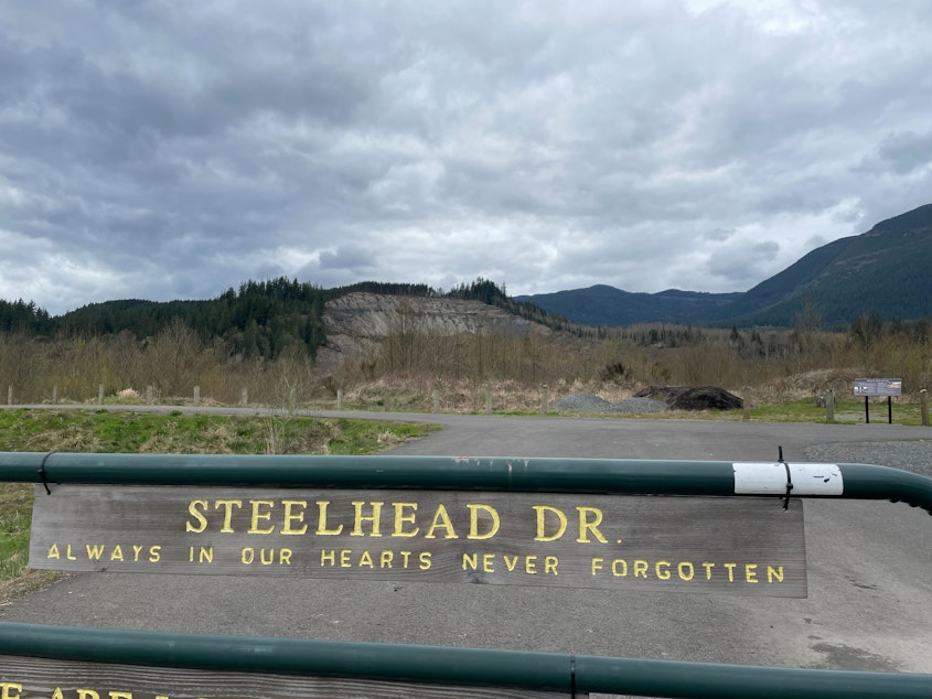 caption: A sign marks Steelhead Drive, the main residential street once covered in debris from the Oso Landslide.