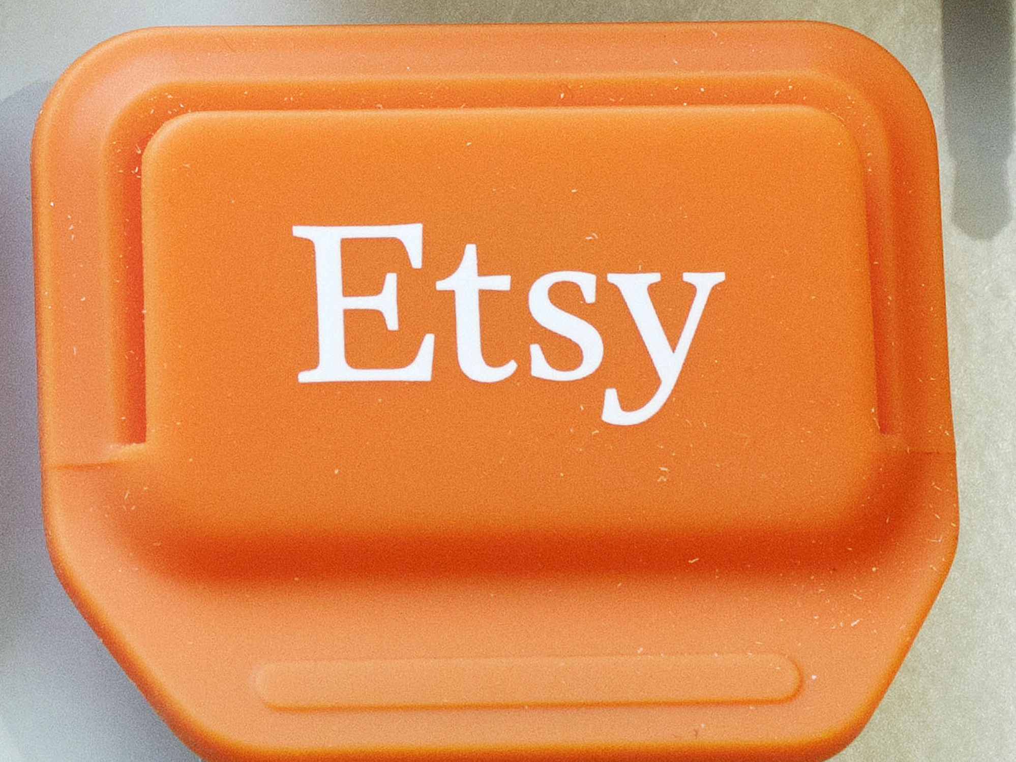 caption: Etsy has increased the 5% transaction fee for sellers to 6.5%.