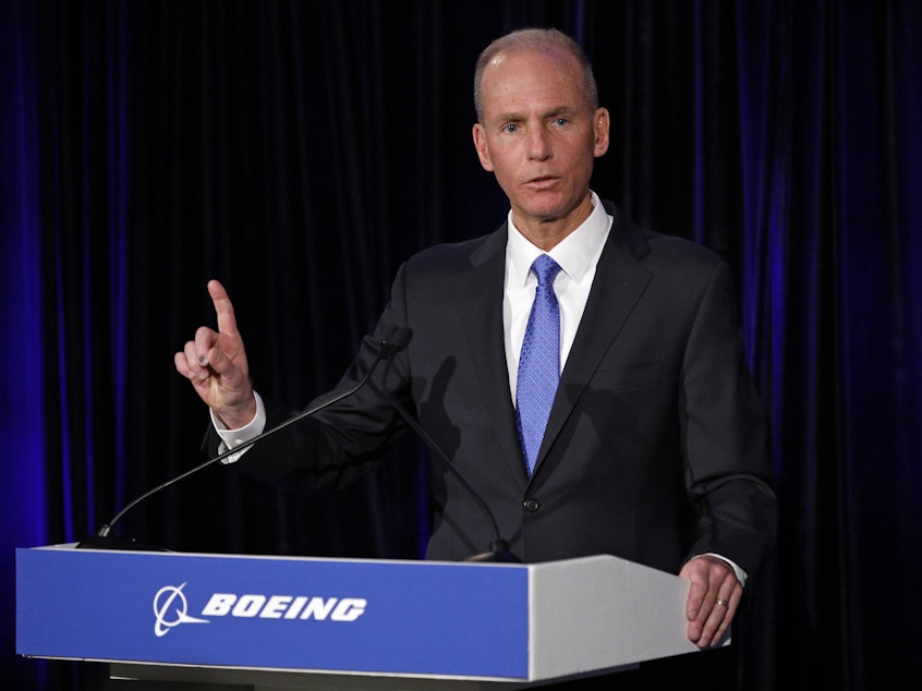 caption: Boeing Chief Executive Dennis Muilenburg speaks during a press conference after the annual shareholders meeting in Chicago on April 29.