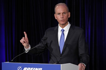 caption: Boeing Chief Executive Dennis Muilenburg speaks during a press conference after the annual shareholders meeting in Chicago on April 29.