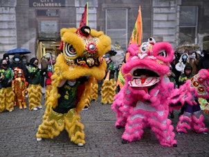caption: Members of the Scottish Chinese community take part in Edinburgh Chinese New Year Festival on Monday in Scotland. Chinese New Year in Edinburgh has become one of the largest celebrations of its kind in Scotland.