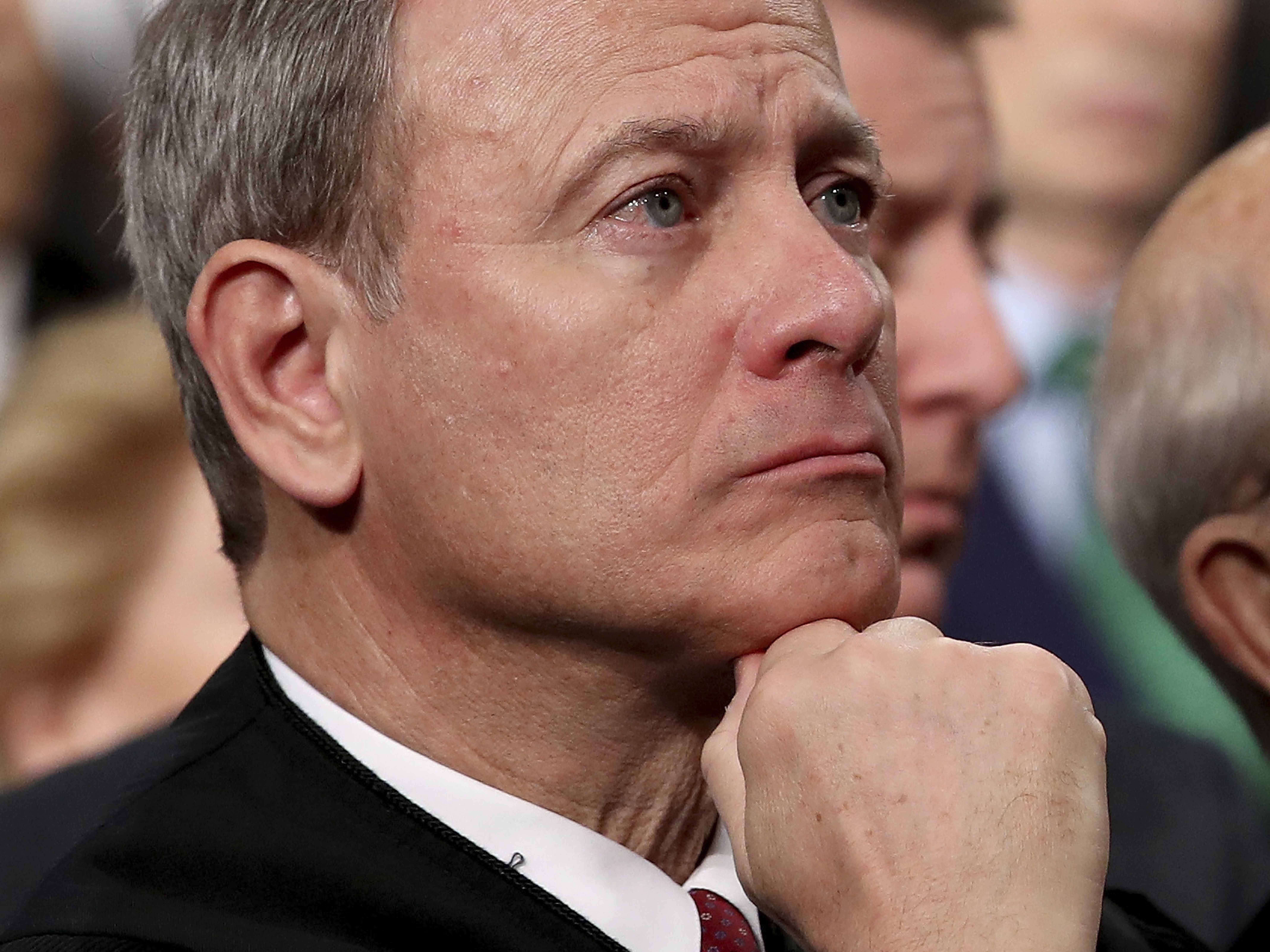 caption: Chief Justice John Roberts says the Supreme Court "doesn't have Obama judges, or Trump judges, Bush judges or Clinton judges."