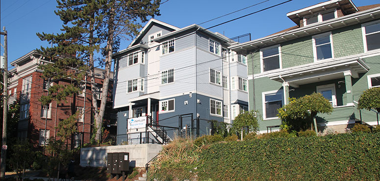 caption: Microhousing offers affordable housing for residents in Seattle, but not without downsides.