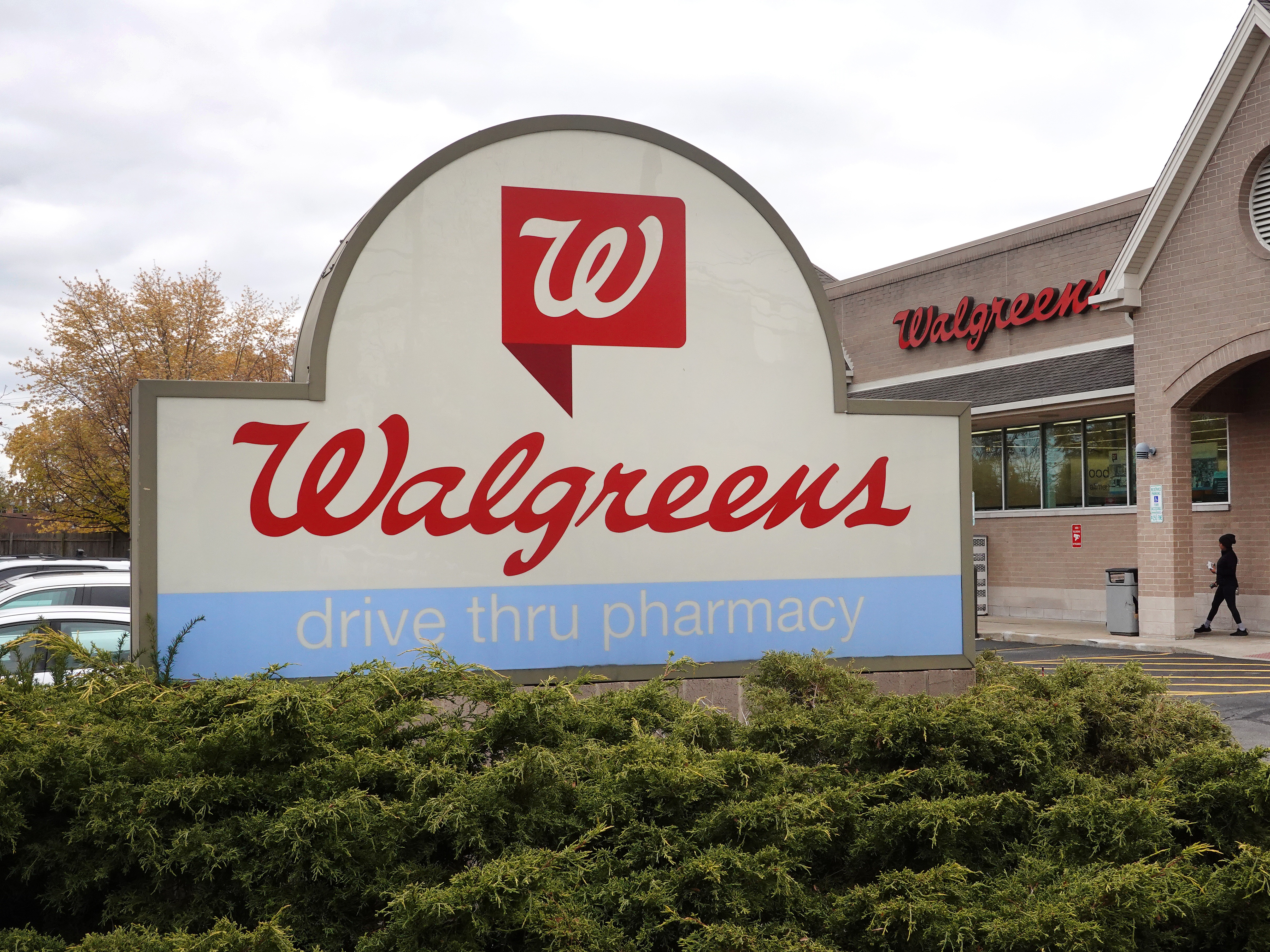 caption: Walgreens said Tuesday it would close 1,200 stores. Rival drugstore chain CVS recently laid off thousands of staff in a bid to cut costs.