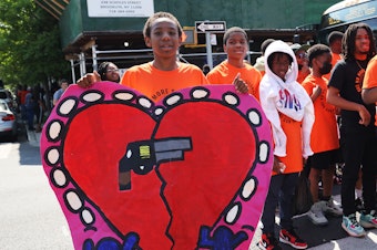 caption: Students from Launch Charter School march on Gun Violence Awareness Day on June 2 last year in Brooklyn, NY.