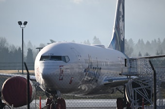 caption: An Alaska Airlines 737 Max 9 that made an emergency landing at Portland International Airport on Jan. 5 is parked in Portland, Ore., on Jan. 23. A door plug blew out shortly after the plane took off from Portland. There were no serious injuries, but it has renewed concerns about Boeing and production lapses.