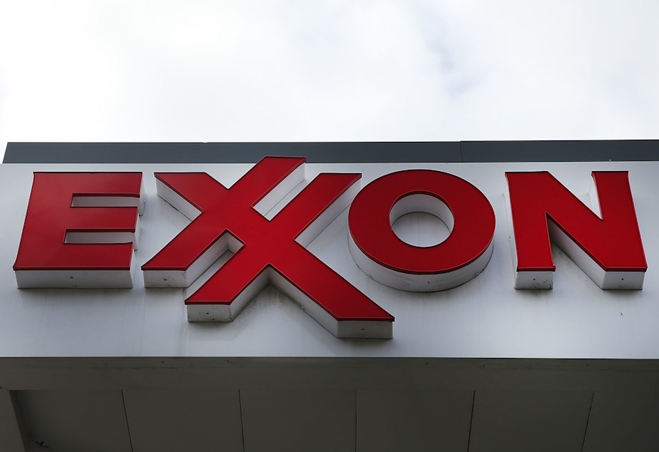 caption: A sign for an Exxon-branded gas station stands in Brooklyn, New York, on Oct. 28, 2016. Oil companies enjoyed a surge in profits in the first three months of 2022.