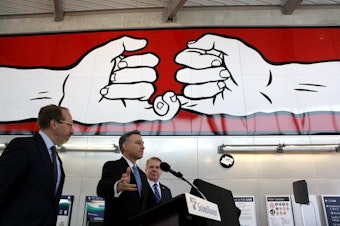 caption: Sound Transit CEO Peter Rogoff, King County Executive Dow Constantine and Seattle Mayor Ed Murray at Capitol Hill’s light rail station.
