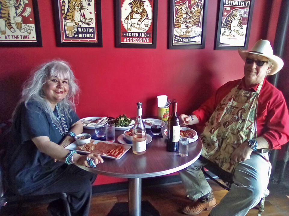 caption: Markeeta Little Wolf and her husband Mike Hubbard come to American 35 every Saturday. Mike Hubbard has a pizza named after him, called Mr. Hubbard's Saturday.