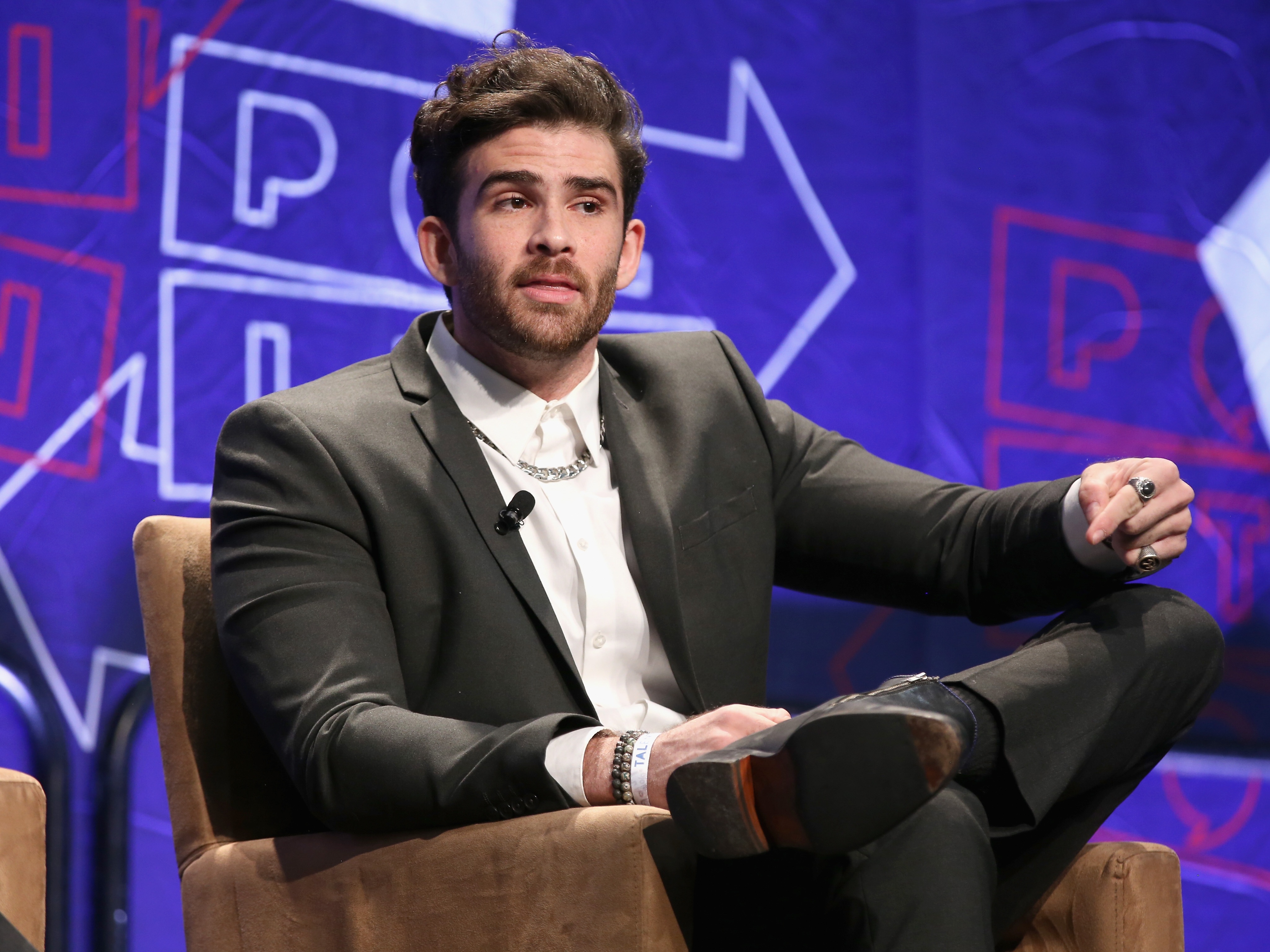 caption: Hasan Piker speaks onstage during Politicon 2018 at Los Angeles Convention Center on October 20, 2018 in Los Angeles.